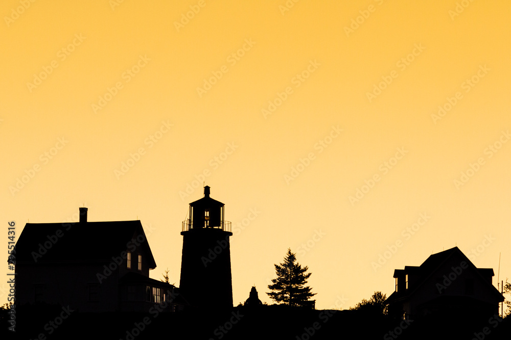 Lighthouse silhouette on orange Lighthouse silhouette on orange
