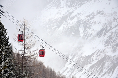 red gondolas in the mountain