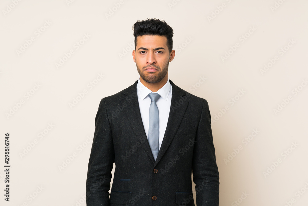 Young handsome businessman man over isolated background sad Young handsome businessman man over isolated background sad