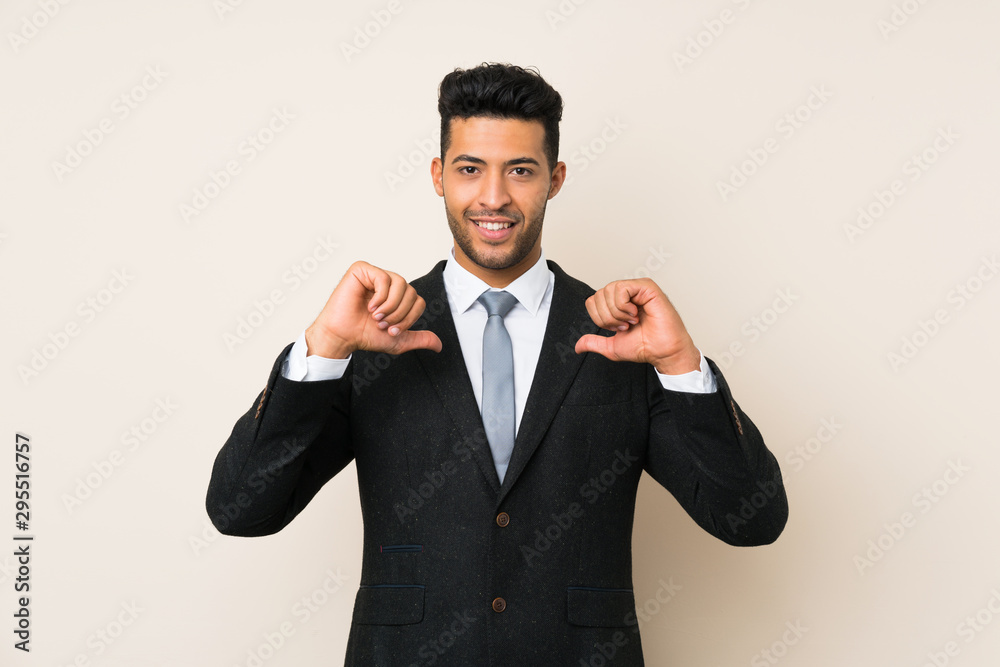 Young handsome businessman man over isolated background proud and self-satisfied Young handsome businessman man over isolated background proud and self-satisfied