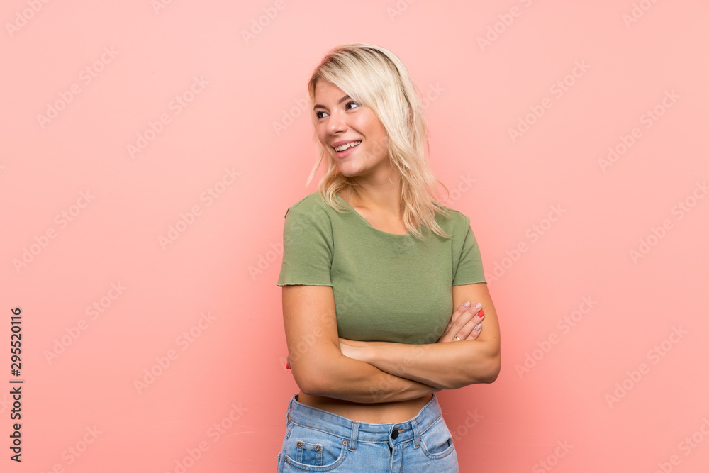Young blonde woman over isolated pink background happy and smiling Young blonde woman over isolated pink background happy and smiling