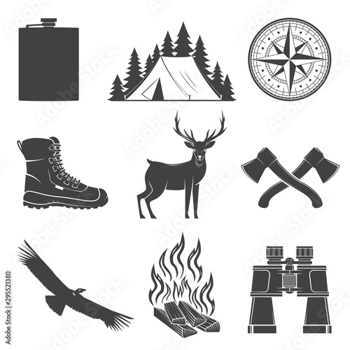 Set of Hiking and Camping icons isolated on the white background. Vector. Set include compass, condor, boots, axe, deer, tent, campfire, flask, binoculars forest silhouette