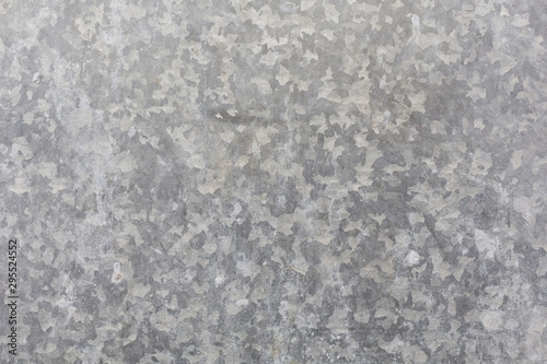 spotted a grey galvanized surface background