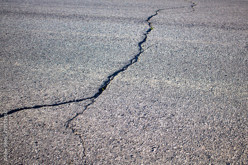 Cracked Asphalt on a Paved Road