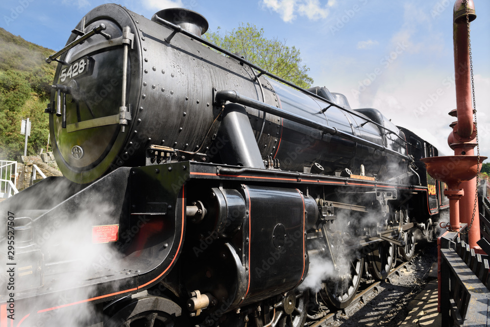 Stanier Black Five LMS 5428 Steam Engine built in 1937 arriving at Goathland railway station North Yorkshire Moors Railway line England Stanier Black Five LMS 5428 Steam Engine built in 1937 arriving at Goathland railway station North Yorkshire Moors Railway line England