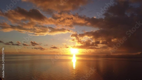 Sunset seen from cruise ship. Beautiful Ocean nature landscape wuith sun flare. photo