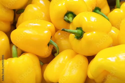 Fresh yellow peppers, closeup background. photo