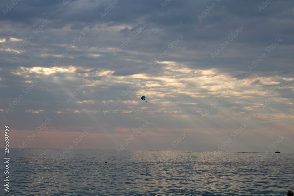 Extreme jet skiing on the Black Sea in the summer evening Extreme jet skiing on the Black Sea in the summer evening