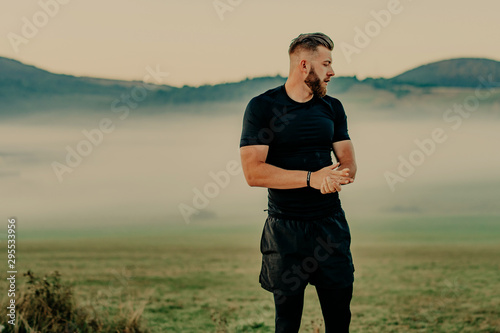 Man in sport clothes training outdoor