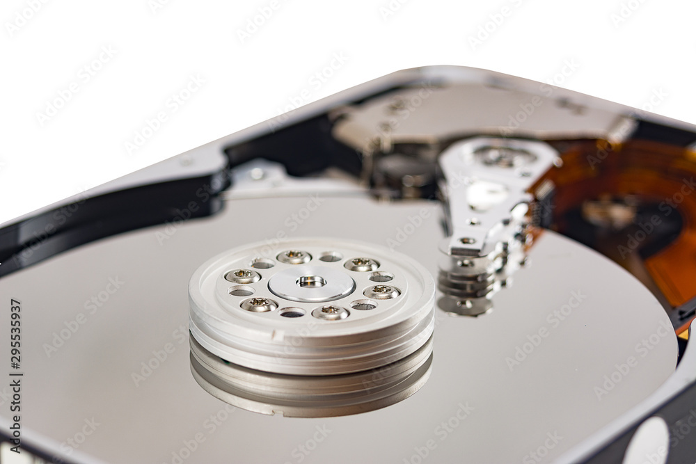 disassembled hard drive on white background, hdd, hard disk drive, close-up disassembled hard drive on white background, hdd, hard disk drive, close-up
