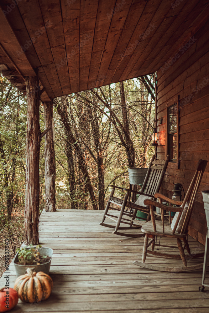 Front porch of a cabin in the woods
