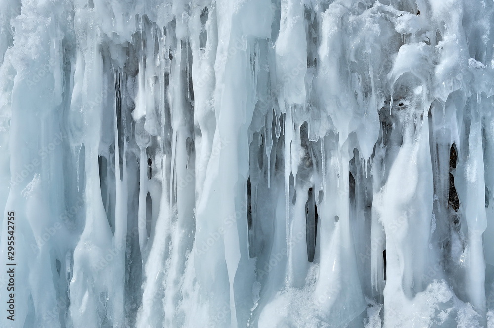 Ice texture formed as a result of freezing sea waves on stones. Ice texture formed as a result of freezing sea waves on stones.