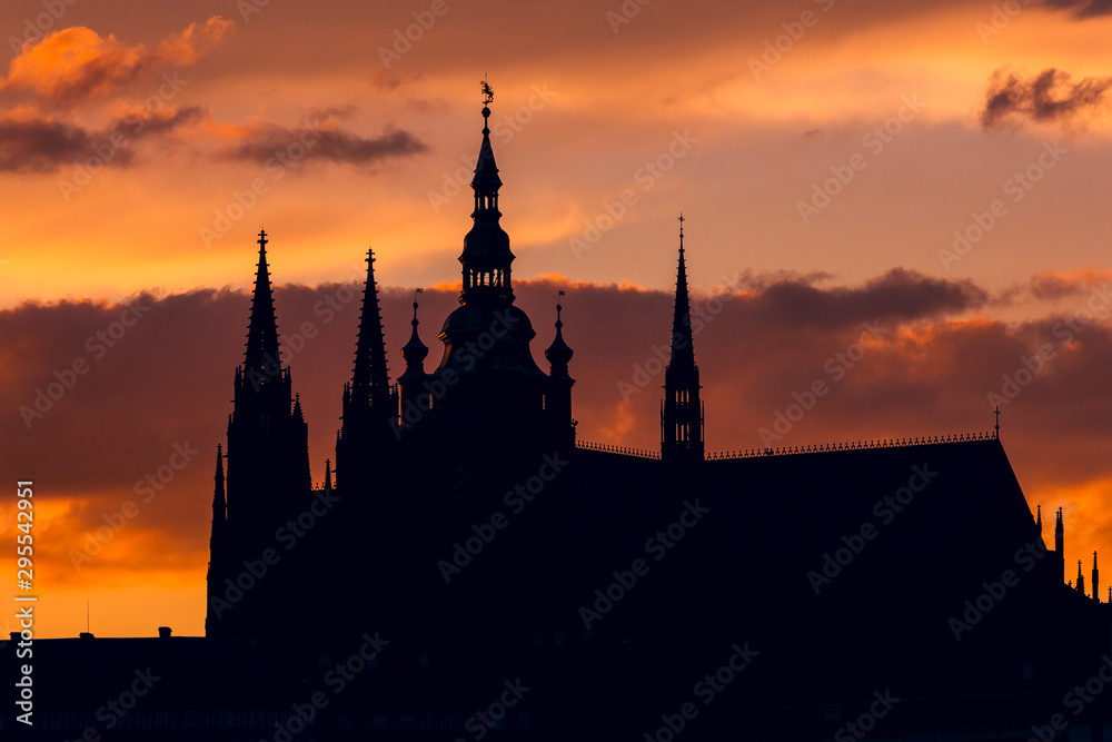 silhouette of an old church at sunset