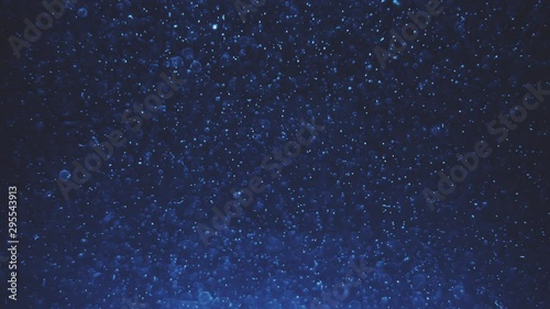 Particles in water. Abstract background