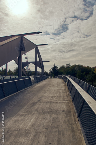 modern bridge on a cloudy sunny day