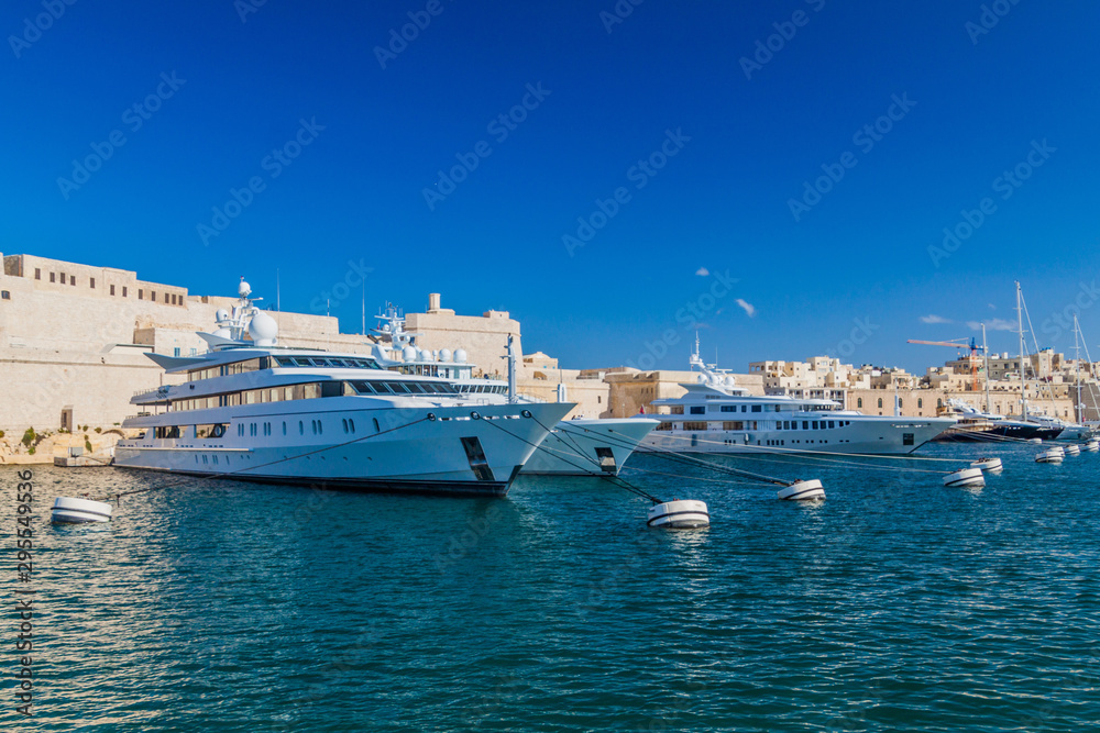 Yachts berthed at the port in Birgu town, Malta