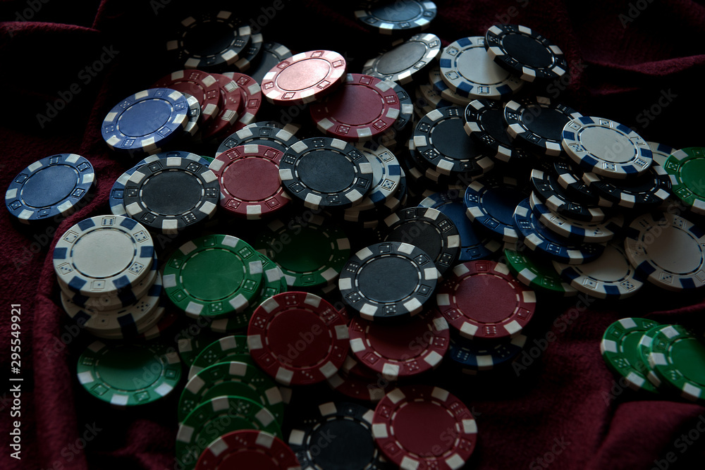 poker chips on black background poker chips on black background