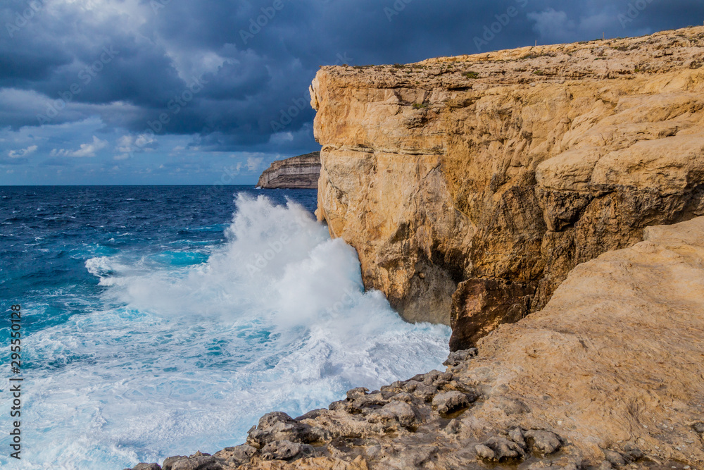 Obraz premium Cliffs of Dwejra, location of the collapsed Azure Window on the island of Gozo, Malta