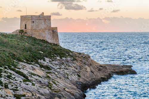 Sunset at the Xlendi Tower on the island of Gozo  Malta