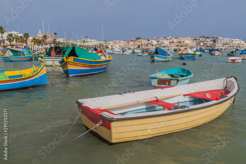 Fishing boats in the harbor of Marsaxlokk town, Malta © Matyas Rehak