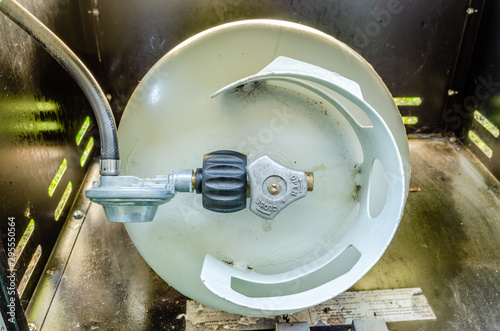 top view of BBQ propane tank and regulator