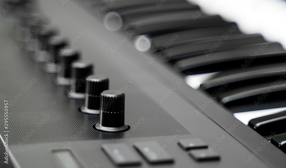 Professional midi keyboard synthesizer with knobs and controllers. Professional midi keyboard synthesizer with knobs and controllers.