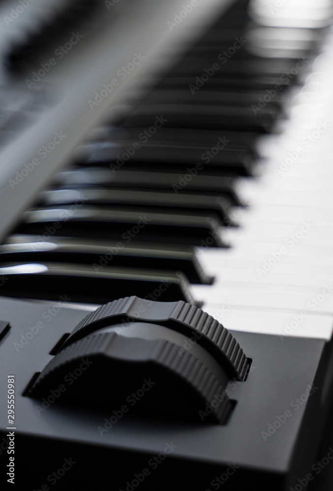 Professional midi keyboard synthesizer with knobs and controllers