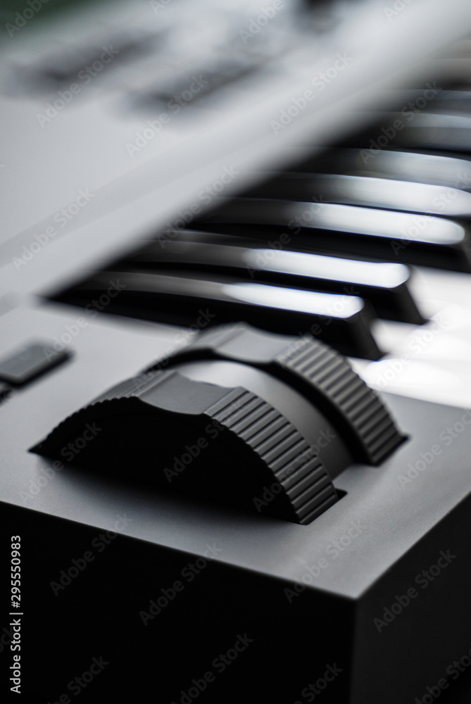 Professional midi keyboard synthesizer with knobs and controllers