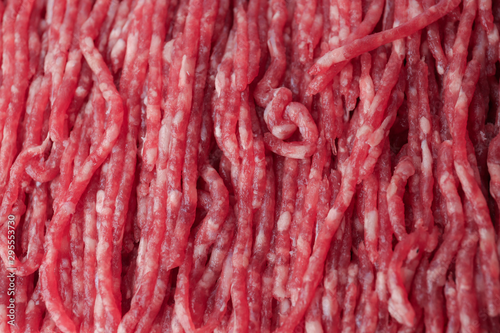 Fresh raw minced meat as background, closeup Fresh raw minced meat as background, closeup
