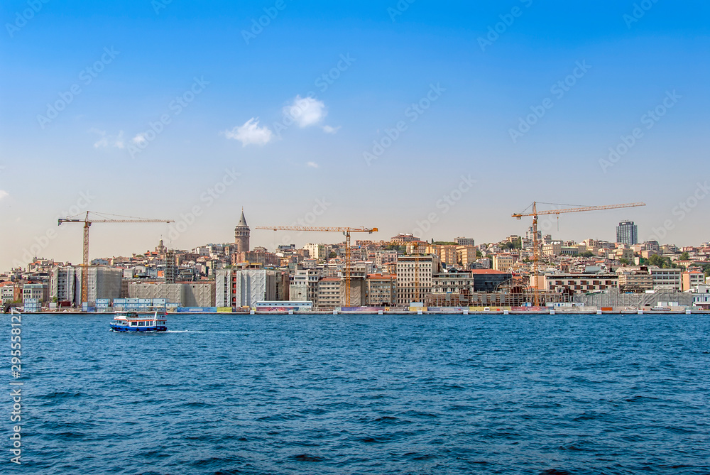 Istanbul, Turkey, 29 June 2019: Karakoy Galata Port, Galata Tower and city ​​lines ships.