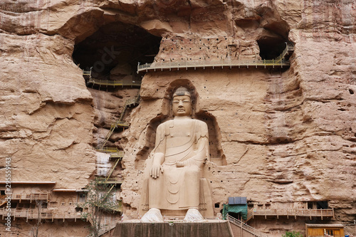 Ancient Chinese Buddha Statue at Bingling Cave Temple in Lanzhou Gansu China. UNESCO World heritage site