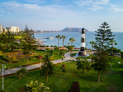 Aerial drone view of Miraflores lighthouse at sunny afternoon. photo