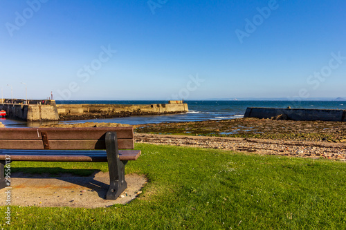 Empty bench overlooking St Monans harbor