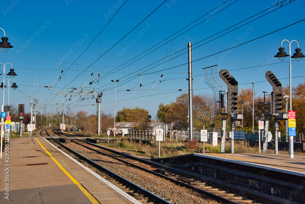 train station in uk, blue sky background train station in uk, blue sky background
