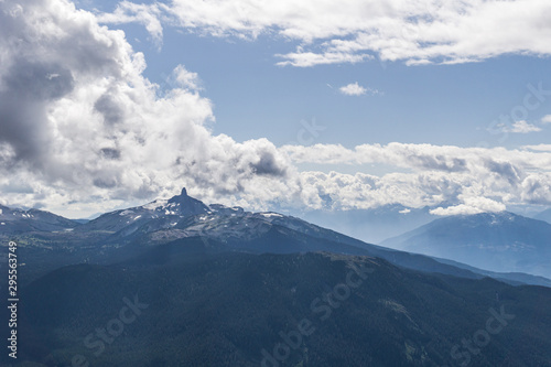 blackcomb mountain peak panorama view cloudy sky summer time. © olegmayorov
