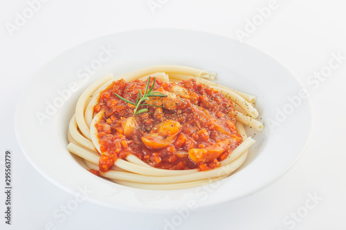 Studio macro Spaghetti bolognese on a white plate