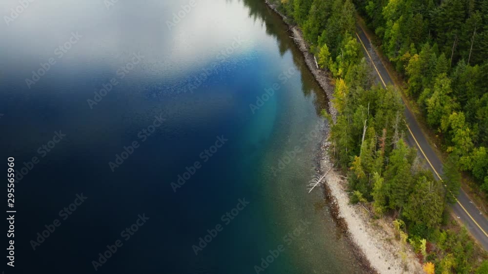 Lake McDonald in Glacier National Park, travel around the United States, beautiful Montana, snowy mountains' tops, breathtaking landscape