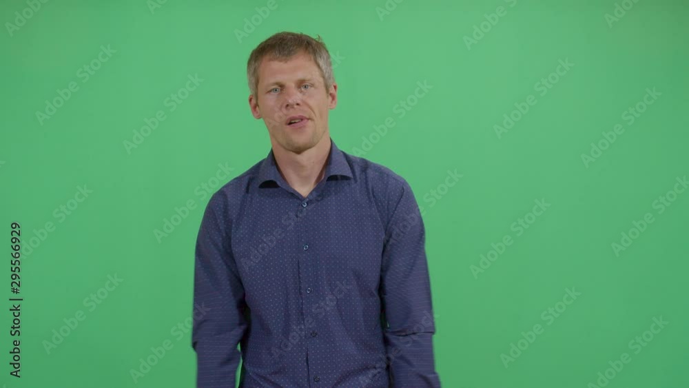 Adult Man Clapping Slowly Disappointed And Unimpressed. Studio Isolated Shot Against Green Screen Background Adult Man Clapping Slowly Disappointed And Unimpressed. Studio Isolated Shot Against Green Screen Background