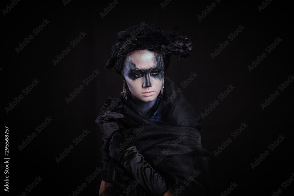 Halloween photo shoot Day of the dead on a black background with in the studio. Halloween photo shoot Day of the dead on a black background with in the studio.