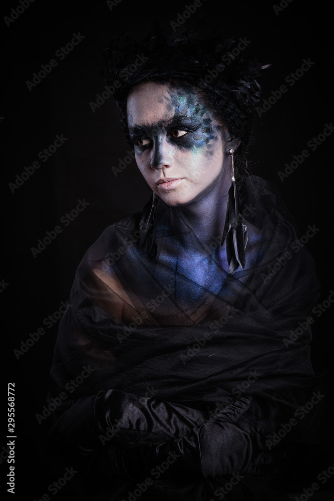 Halloween photo shoot Day of the dead on a black background with in the studio. Halloween photo shoot Day of the dead on a black background with in the studio.