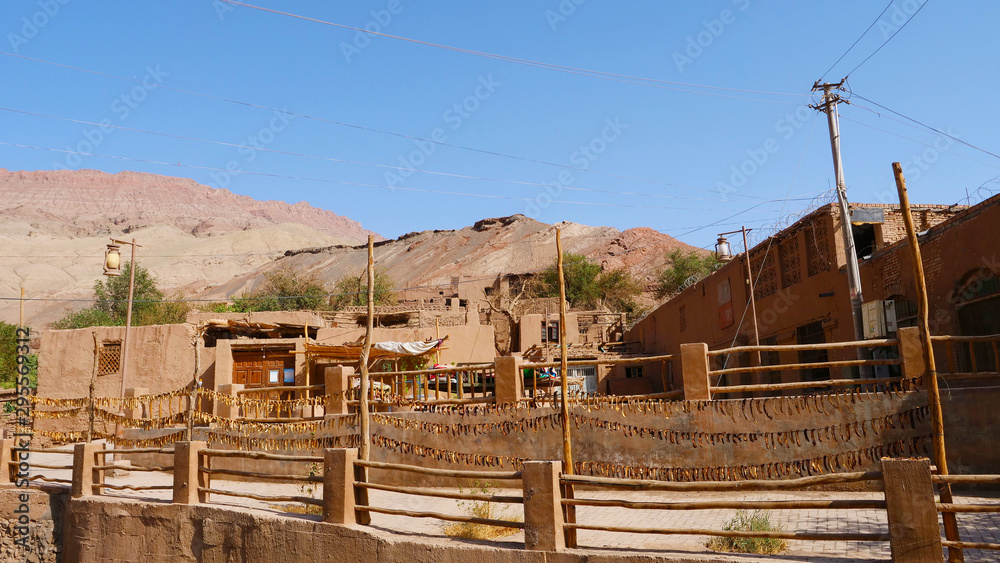 Fototapeta premium Ancient traditional residential old house in Tuyoq village valley inTurpan Xinjiang Province China.