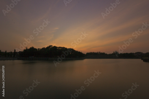 sunset over the lake © Ilham