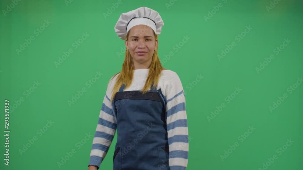 Kung Fu Woman Cook Fighting With The Dark Spirit Of The Kitchen. Studio Isolated Shot Against Green Screen Background Kung Fu Woman Cook Fighting With The Dark Spirit Of The Kitchen. Studio Isolated Shot Against Green Screen Background