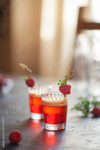 Alcoholic layered liqueur in shot glass
