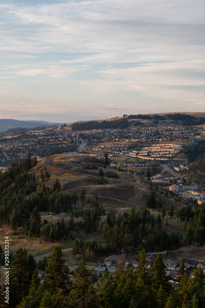 Beautiful Aerial View of a Canadian City, Kamloops, during a colorful summer sunrise. Located in the Interior British Columbia, Canada.