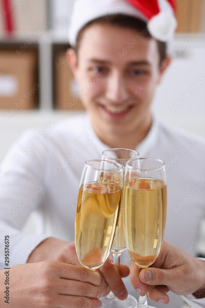A group of businesspeople celebrating Christmas A group of businesspeople celebrating Christmas