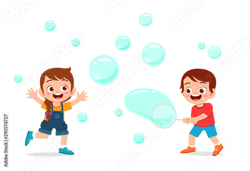 cute kid boy and girl blow bubble