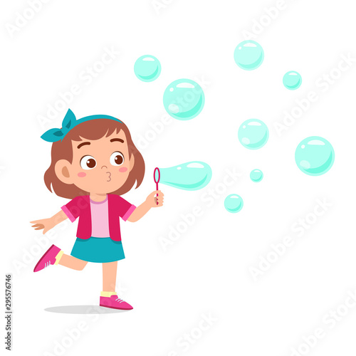 happy cute kid girl blow bubble soap