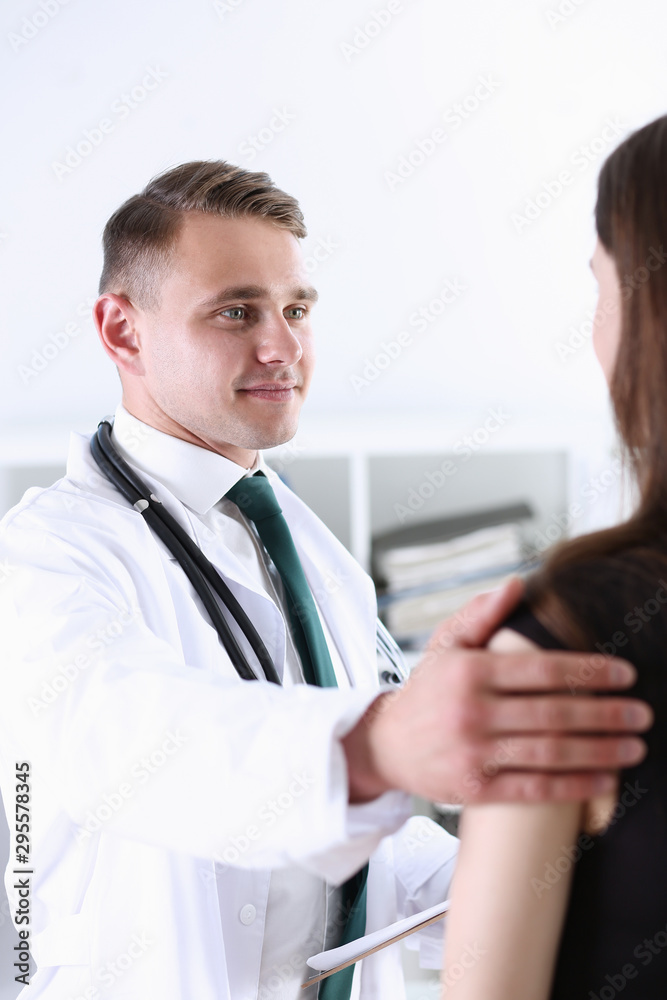 Handsome friendly male doctor talk with thankful Handsome friendly male doctor talk with thankful