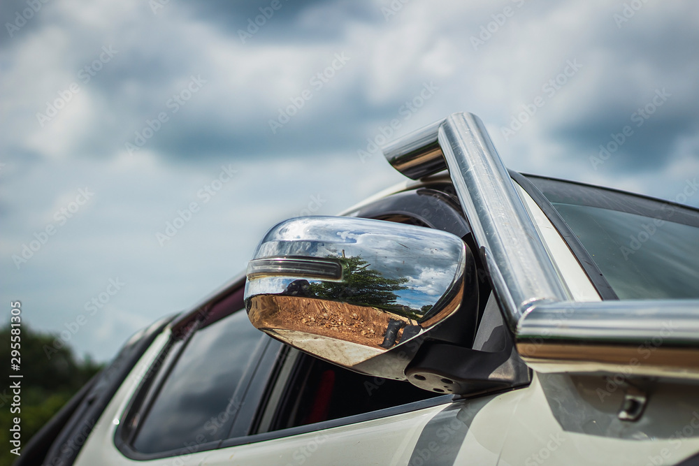 Fototapeta premium Vehicle snorkel and side mirrors on off-road vehicles, Side mirror turning lights.